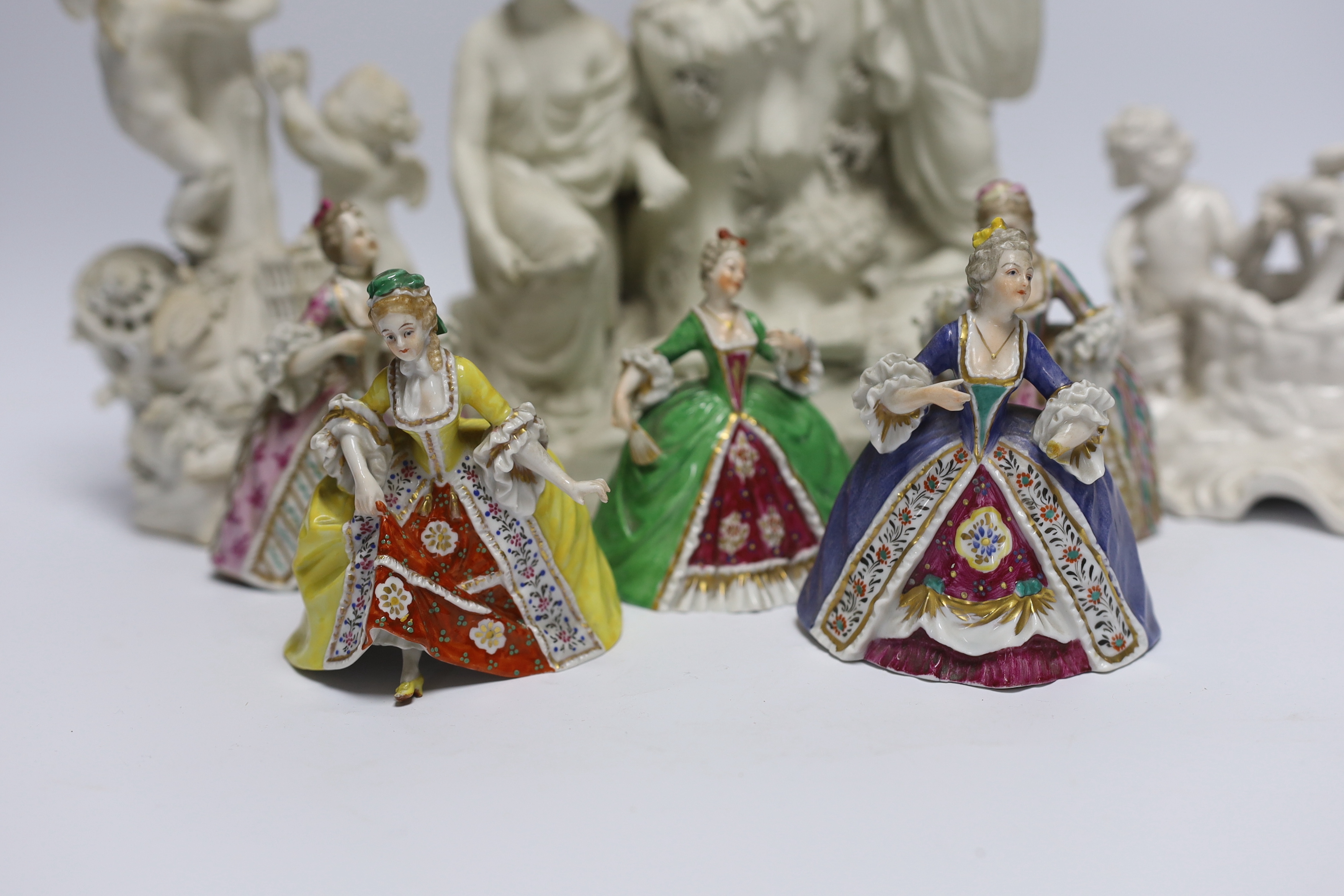 Two late 18th century biscuit figural centrepieces, six figurines and another, tallest 40cm